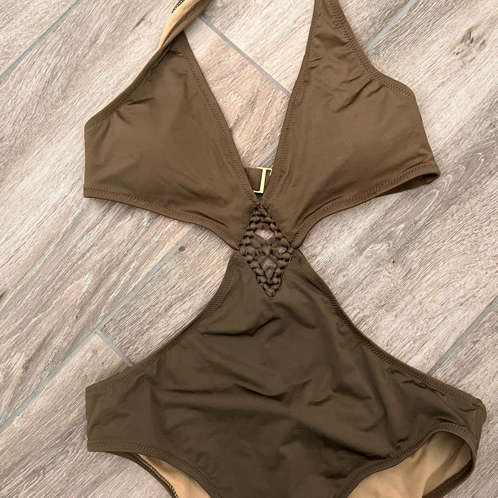 New bcbg swimsuit , never worn &  sealed 
L